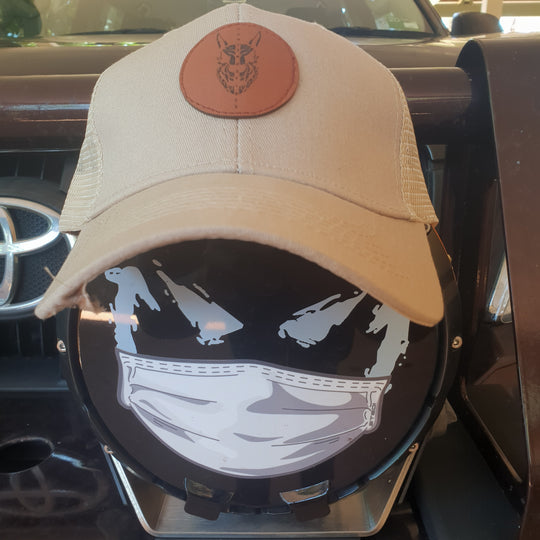 Truckers Hat In Dogs We Trust logo